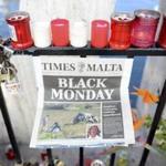 Candles, notes and paper cuttings lie next to the Love Monument in St. Julian, Malta, Tuesday Oct. 17, 2017 the day after the killing of journalist Daphne Caruana Galizia. Daphne Caruana Galizia, the Maltese investigative journalist who exposed the island nation's links to offshore tax havens through the leaked Panama Papers, was killed Monday when a bomb exploded in her car. (AP Photo/ Rene Rossignaud)