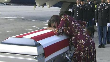 Myeshia Johnson cried over the casket of her husband, Sgt. La David Johnson. 
