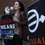 Attorney Wendy Murphy and a small group protested the Trump administration?s plan to roll back campus sex assault rules at the Moakley Federal Courthouse in Boston Thursday.