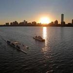 Rowers on the Charles River at sunrise on Friday.