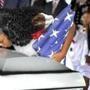 Myeshia Johnson, the wife of Army Sgt. La David Johnson, kissed her husband's casket during his funeral service at the Hollywood Memorial Gardens in Hollywood, Fla., Saturday. 