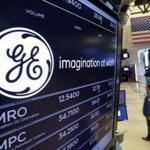 General Electric reported a decline in third-quarter profits on Monday, sending shares sharply lower, as weakness in the oil and gas and power businesses once again weighed on results.