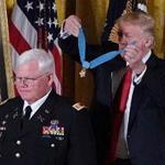 President Trump recounted the valor under fire of retired Army Captain Gary M. Rose at a White House ceremony.