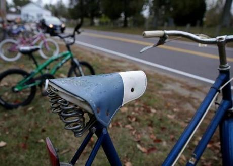Morning rain was visible Tuesday on the seat of a vintage bicycle in Pembroke.
