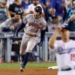 LOS ANGELES, CA - OCTOBER 25: George Springer #4 of the Houston Astros runs the bases after hitting a two-run home run during the eleventh inning against the Los Angeles Dodgers in game two of the 2017 World Series at Dodger Stadium on October 25, 2017 in Los Angeles, California. (Photo by Ezra Shaw/Getty Images)