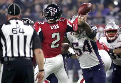 Houston, Feb. 5, 2017 - New England Patriots middle linebacker Dont'a Hightower (54) makes a key turnover knocking the ball out of the hand of Atlanta Falcons quarterback Matt Ryan (2) during the fourth quarter at NRG Stadium in the Super Bowl. The Atlanta Falcons play the New England Patriots in Super Bowl LI at NRG Stadium in Houston on Feb. 5, 2017. Barry Chin / Globe staff.
