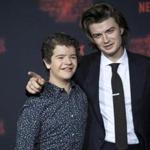 Joe Keery (right) with his ?Stranger Things? castmate Gaten Matarazzo at the second season premiere in LA.