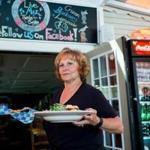 Ann LePage, Maine?s first lady, waits tables at McSeagull?s in Boothbay Harbor in 2016.