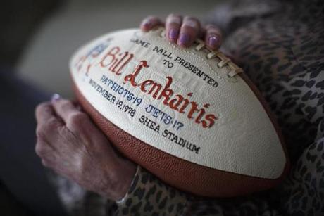 Donna Lenkaitis, widow of former Patriots player Bill Lenkaitis, held a game ball of her husband?s at Terri Johnson?s home in Canton.
