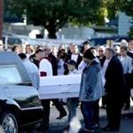 Pallbearers carried the casket to the funeral Mass for Javian Candolario at St. Michael Church in Lowell.