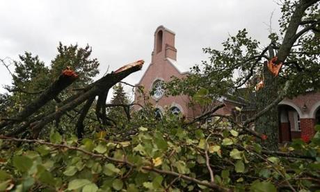 Heavy winds and rain overnight caused major damage across the region, including a large tree that snapped in front of St. Michael Church on Main Street in North Andover. 
