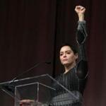 Actress Rose McGowan raised her fist Friday at the Women?s Convention in Detroit.