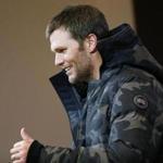 New England Patriots quarterback Tom Brady donned a particularly puffy jacket on his way into the game and again at his post-game press conference on Sunday.