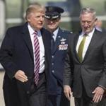 US President Donald Trump greeted Secretary of Defense James Mattis at Andrews Air Force Base in Maryland in August.  