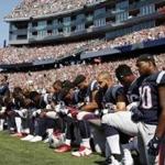 Several New England Patriots players knelt during the national anthem at a September game in Foxborough. 