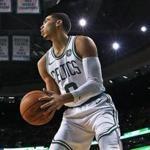 Boston, MA: 10-24-17: With Boston championship banners hanging above him in the backround, Celtics rookie Jayson Tatum gets ready to fire up a step back three point shot attempt. The Boston Celtics hosted the New York Knicks in a regular season NBA basketball game at the TD Garden. (Jim Davis/Globe Staff)