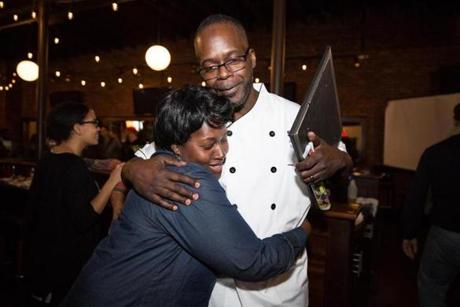 Boston, MA -- 11/02/17 -- Anthony Caldwell of 50 Kitchen hugs supporter Yolanda Anderson after winning the Fields Corner retail space competition on November 2, 2017, in Boston, Massachusetts. Four applicants pitched their business ideas, competing for a retail storefront in the Fields Corner neighborhood of Dorchester. (Kayana Szymczak for The Boston Globe)
