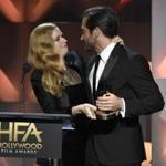 Amy Adams presents Jake Gyllenhaal with the Hollywood actor award for 