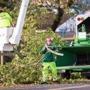 10/30/2017 SALEM, MA DPW workers Jim O'Brien (cq) (left) and Brian Hughes (cq) clear trees off Fort Avenue in Salem after an overnight storm. (Aram Boghosian for The Boston Globe)
