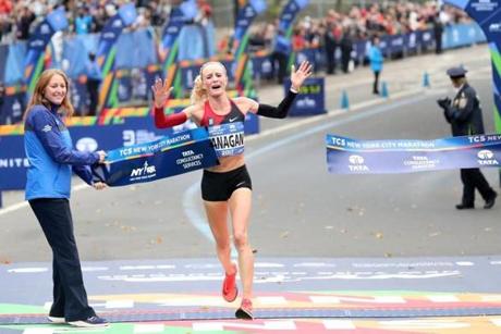 Shalane Flanagan of Marblehead crossed the finish line to win the Professional Women's Divisions of the New York City Marathon Sunday. 
