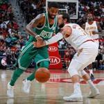 Kyrie Irving drew a foul from Marco Belinelli n Atlanta, GA., on Monday.