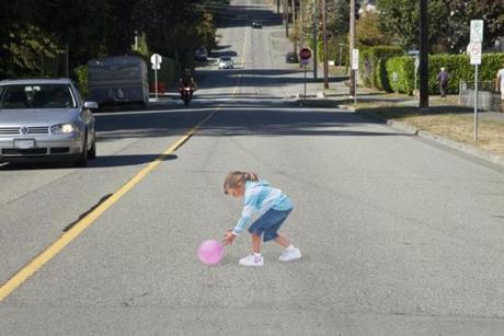 In West Vancouver Canada, a nonprofit installed a 3-D decal on a road near a school to raise awareness about drivers speeding through school zones.
