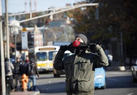 11/11/2017 - Chelsea, MA - People waited for busses in Bellingham Square in Chelsea, MA on Saturday morning, November 11, 2017, where a TD Bank temperature marquee read 24-degrees. Temperatures dipped dramatically in New England on Veterans Day weekend. Photo by Dina Rudick11/11/2017 - Chelsea, MA - People waited for busses in Bellingham Square in Chelsea, MA on Saturday morning, November 11, 2017, where a TD Bank temperature marquee read 24-degrees. Temperatures dipped dramatically in New England on Veterans Day weekend. Topic: 12weather(2). Photo by Dina Rudick11/11/2017 - Chelsea, MA - Joseph Ardolino, from Revere, MA, waited for his bus in Bellingham Square in Chelsea, MA on Saturday morning, November 11, 2017, where a TD Bank temperature marquee read 24-degrees. Of the cold weather, Ardolino said, 