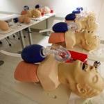 FILE - In this Friday, Aug. 4, 2017 file photo, mannequins are arranged to train CPR to incoming medical students in Jackson, Miss. A study released on Sunday, Nov. 12, 2017 shows women are less likely than men to get CPR from a bystander and more likely to die, and researchers think that reluctance to touch a woman's chest may be one reason. (AP Photo/Rogelio V. Solis)