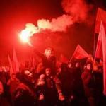 Polish nationalists carried Polish national flags and light flares as they take part in the March of Independence.