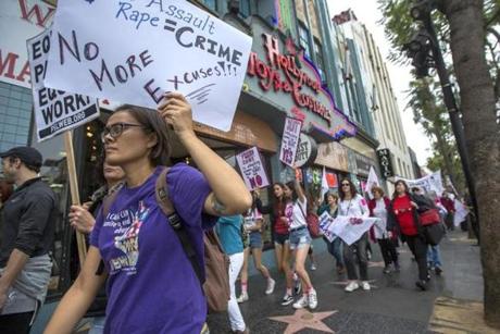 Demonstrators participated in the #MeToo Survivors' March on Sunday in response to the recent high-profile sexual abuse cases.
