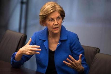 US Senator Elizabeth Warren spoke during a Boston Globe editorial board meeting Friday. 
