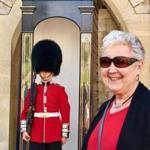 Susan Muther, the author?s mom, watches the changing of the guard at Buckingham Palace.