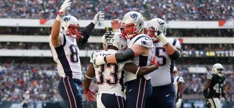 Patriots receiver Danny Amendola celebrated after scoring in the first half.
