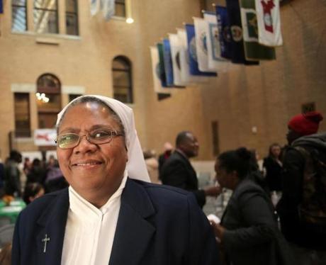 Boston, MA - 11/21/17 - Sister Marie-Judith Dupuy (cq) gave a passionate defense of TPS. MIRA's 13th annual Thanksgiving luncheon at the State House was held the morning after the Trump administration decided to revoke the TPS status for more than 50,000 Haitians around the nation. (Lane Turner/Globe Staff) Reporter: (Cristela Guerra) Topic: (22SharedTable)
