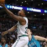 Boston Ma 11/10/17 Boston Celtics Marcus Smart drives to the basket past Charlotte Hornets Cody Zeller during first quarter action at the TD Garden. (Matthew J. Lee/Globe staff) topic reporter: 