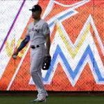Miami Marlins right fielder Giancarlo Stanton walks in the outfield before a baseball game against the Atlanta Braves, Sunday, Oct. 1, 2017, in Miami. (AP Photo/Lynne Sladky)