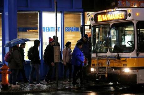 Chelsea, MA -- 11/22/2017 - Passengers in Bellingham Square board a 111 bus. (Jessica Rinaldi/Globe Staff) Topic: 23buscash Reporter: 

