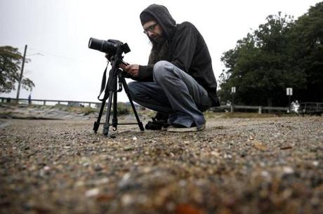 Jason Torres, of Mason, N.H., uses his camera to search for evidence of the Earth?s curvature. He says he hasn?t found any.
?When you let go of everything you?ve ever known, willingly, it?s like you?ve lost yourself, lost your identity,? Jason Torres says. ?It?s like you start all over again.?
