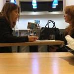 Washington Post reporter Stephanie McCrummen (left) interviewed Jaime T. Phillips at a Greek restaurant in Alexandria, Va.