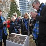 BOSTON, MA - 11/30/2017: On the 100th anniversary of the Halifax Explosion, L-R Boston Mayor Marty Walsh, Beth Thomson, Margaret Miller, National Resource Minister Nova Scotia and Nova Scotia Premier, Stephen McNeil unveil a monument on Boston Common to honor the relationship between Canada and Boston. (David L Ryan/Globe Staff ) SECTION: METRO TOPIC 01treelighting