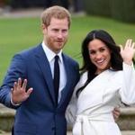 Prince Harry and Meghan Markle posed for pictures on the grounds of Kensington Palace in London after announcing their engagement.  