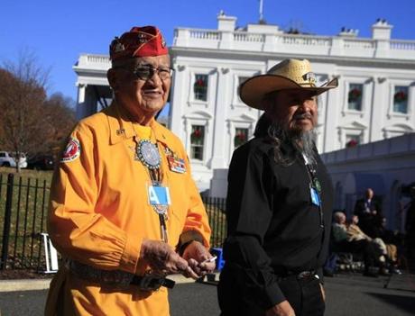 Navajo Code Talker Thomas Begay (left) and retired Army colonel Ronald Begay in Washington Monday. 
