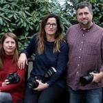 11/30/2017 Milton - Ma- Sharon Reiley (cq) left Jessica McDaniel (cq) middle and Bill McCarty (cq) right are part of group of Photographers who are traveling to Houston,to photograph people who have lost their family photograps due to Hurricane Harvey. Jonathan Wiggs\Globe Staff Reporter:Topic. 