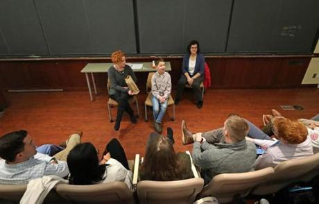 Braeden Yee, 11, talks with a group of students at BU?s School of Medicine. 

