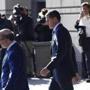 Michael Flynn, former U.S. national security adviser, center, departs the U.S. Courthouse in Washington on Friday after pleading guity to lying to federal officers. MUST CREDIT: Bloomberg photo by Aaron P. Bernstein