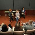 Braeden Yee, 11, talks with a group of students at BU?s School of Medicine. 
