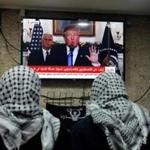 Palestinian men watched an address given by President Trump at a cafe in Jerusalem.
