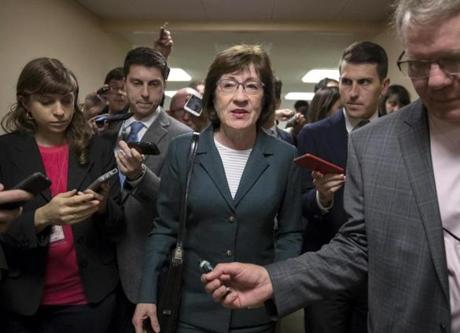 Sen. Susan Collins, R-Maine, and other senators rush to the chamber to vote on amendments as the Republican leadership works to craft their sweeping tax bill in Washington.
