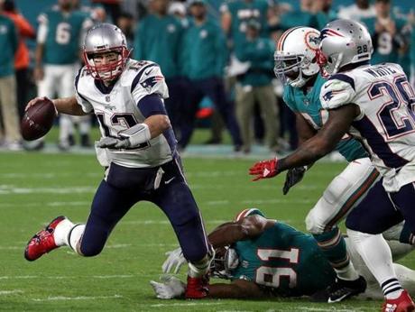Dolphins defensive end Cameron Wake forced Tom Brady to throw away a pass late in the fourth quarter.

