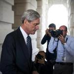 FILE -- Robert Mueller, the Justice DepartmentÕs special counsel, at the Capitol in Washington, June 21, 2017. Senior FBI officials who helped investigate Donald TrumpÕs presidential campaign last year told a colleague that Hillary Clinton Òjust has to winÓ and described a potential Trump victory as Òterrifying,Ó according to texts released Dec. 12. (Doug Mills/The New York Times)